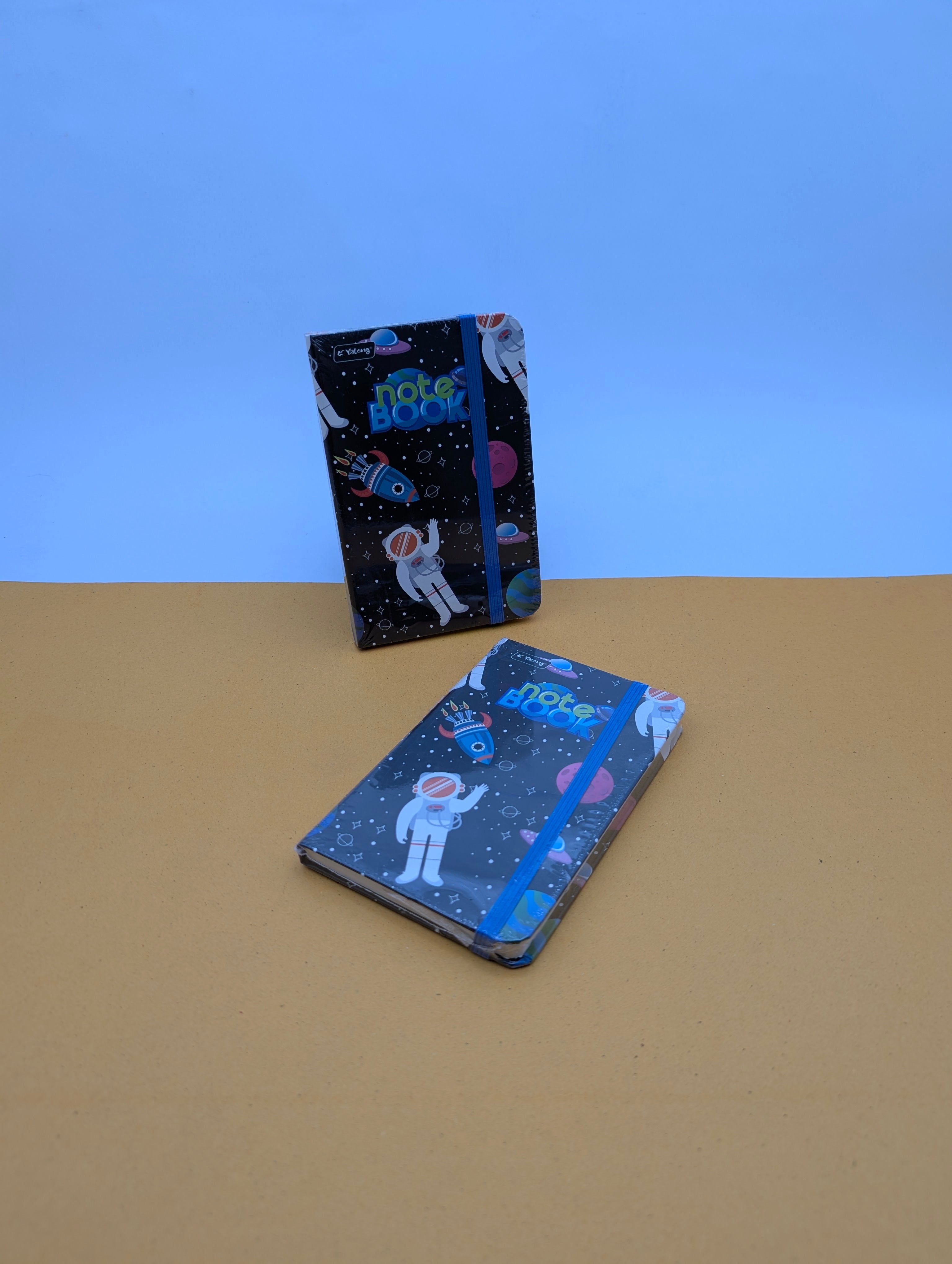 SPACE-THEMED ELASTIC CLOSURE NOTEBOOKS SMALL