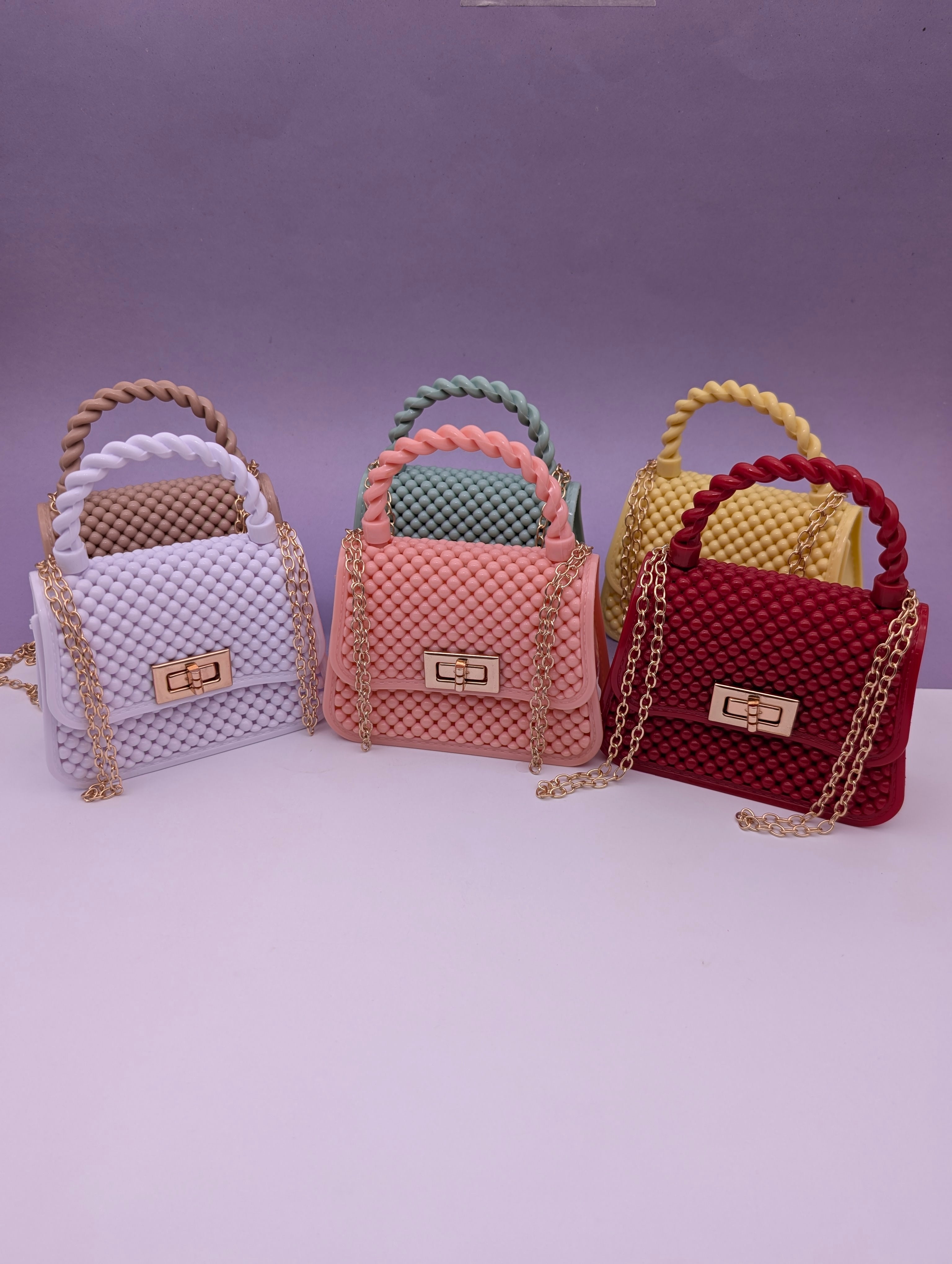 TEXTURED TWIST HANDLE MINI BAGS