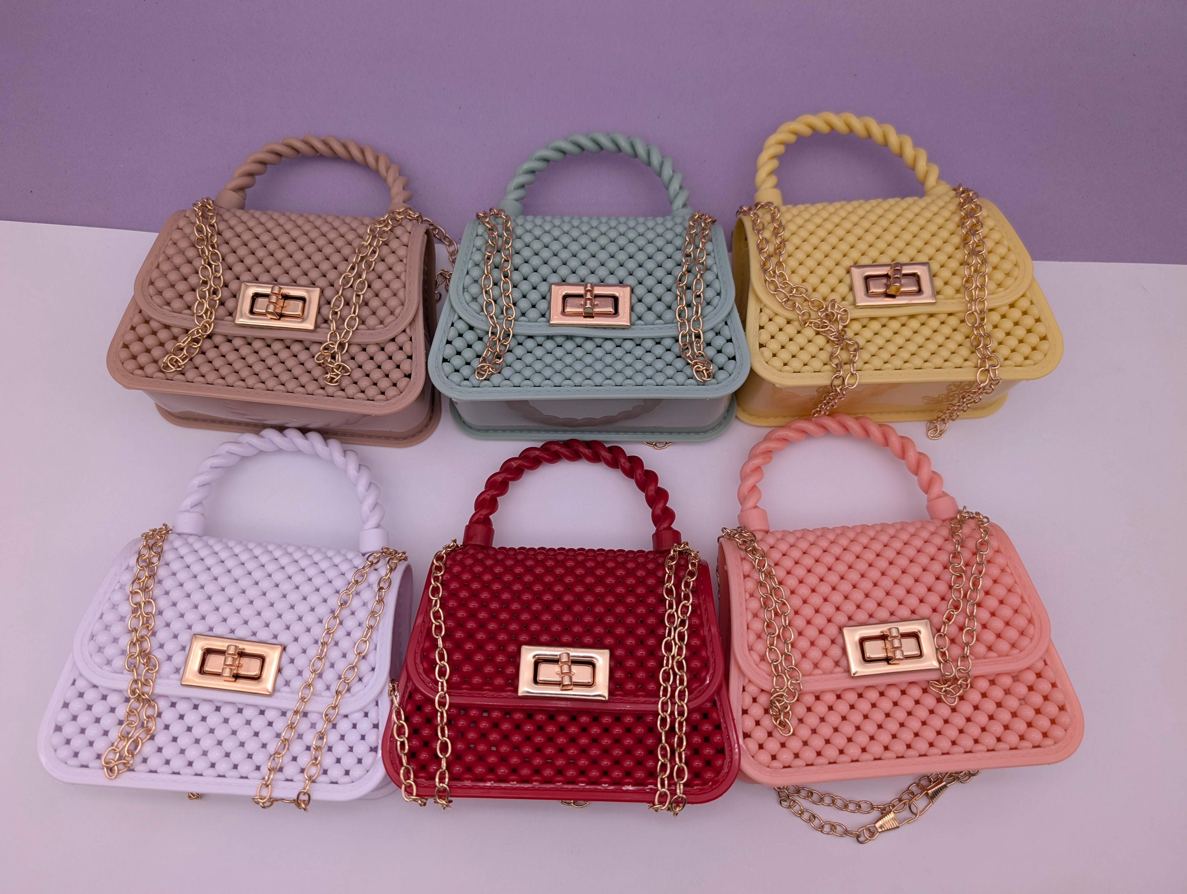 TEXTURED TWIST HANDLE MINI BAGS