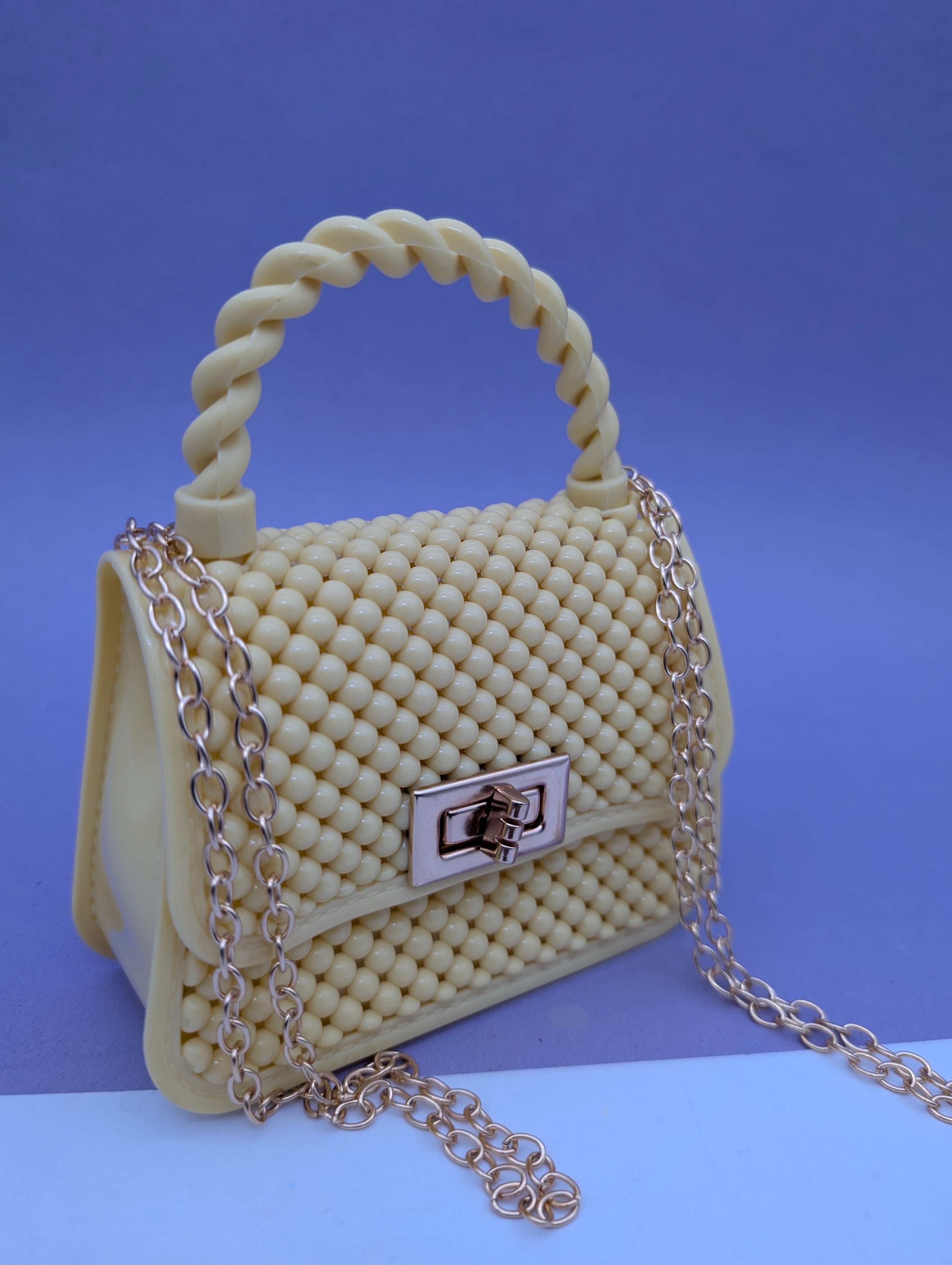 TEXTURED TWIST HANDLE MINI BAGS