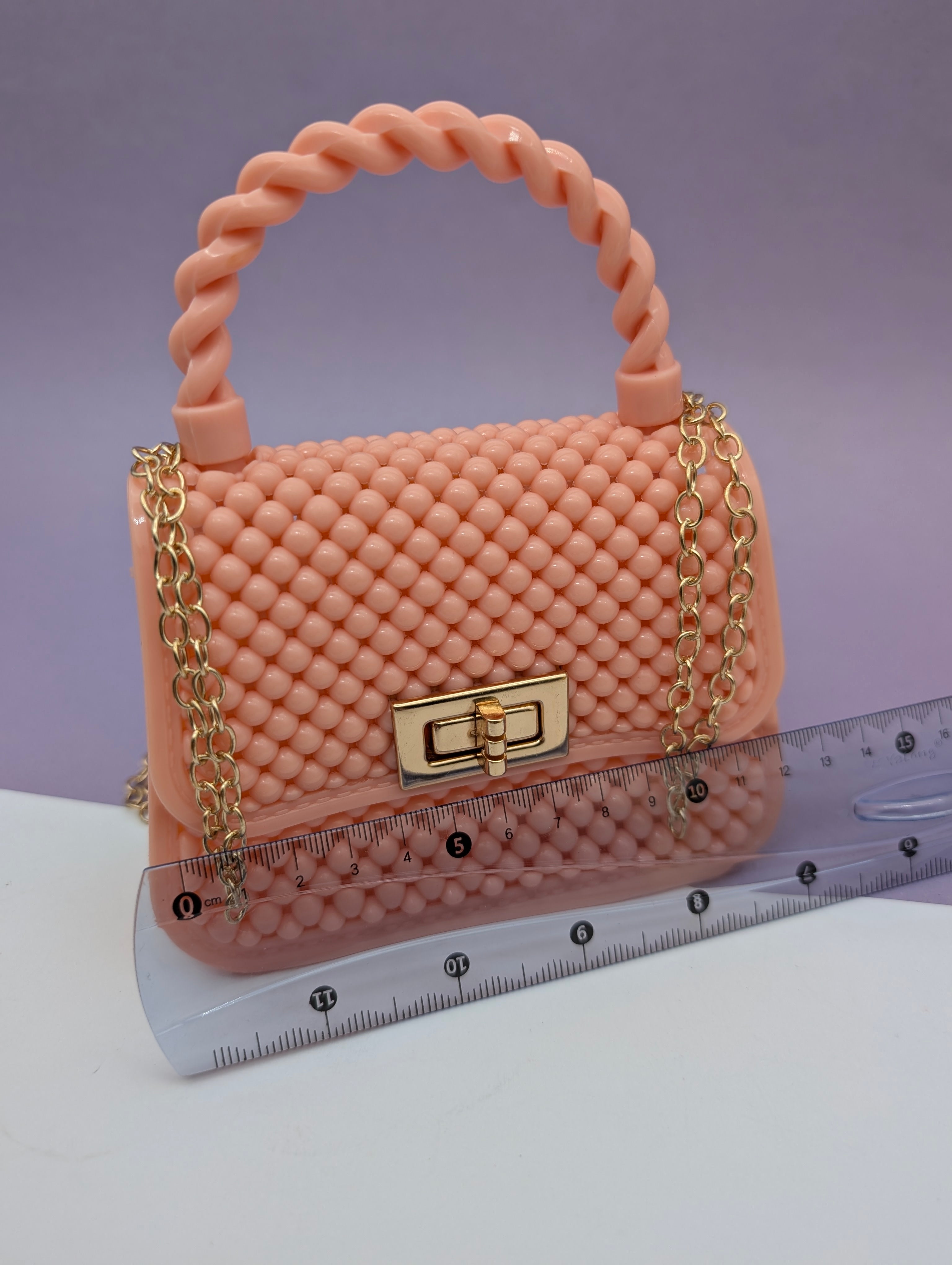 TEXTURED TWIST HANDLE MINI BAGS