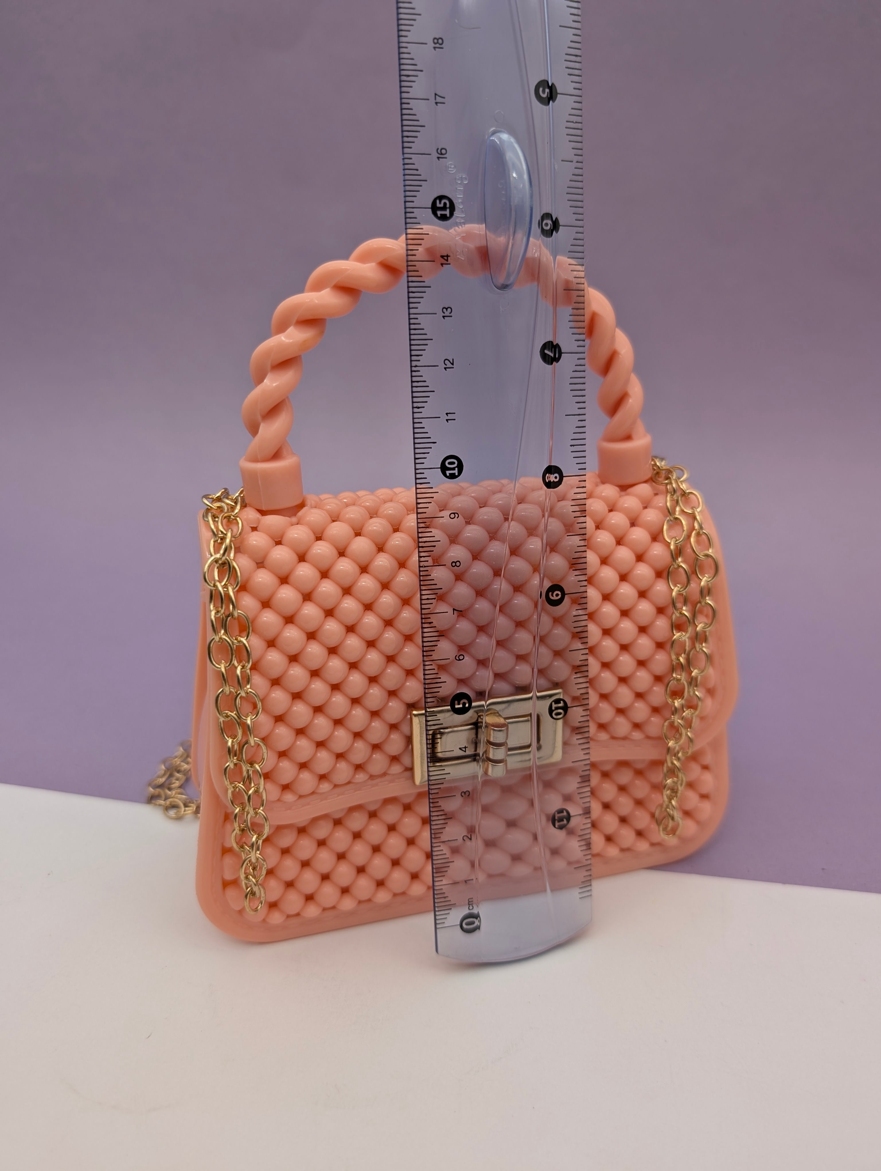 TEXTURED TWIST HANDLE MINI BAGS
