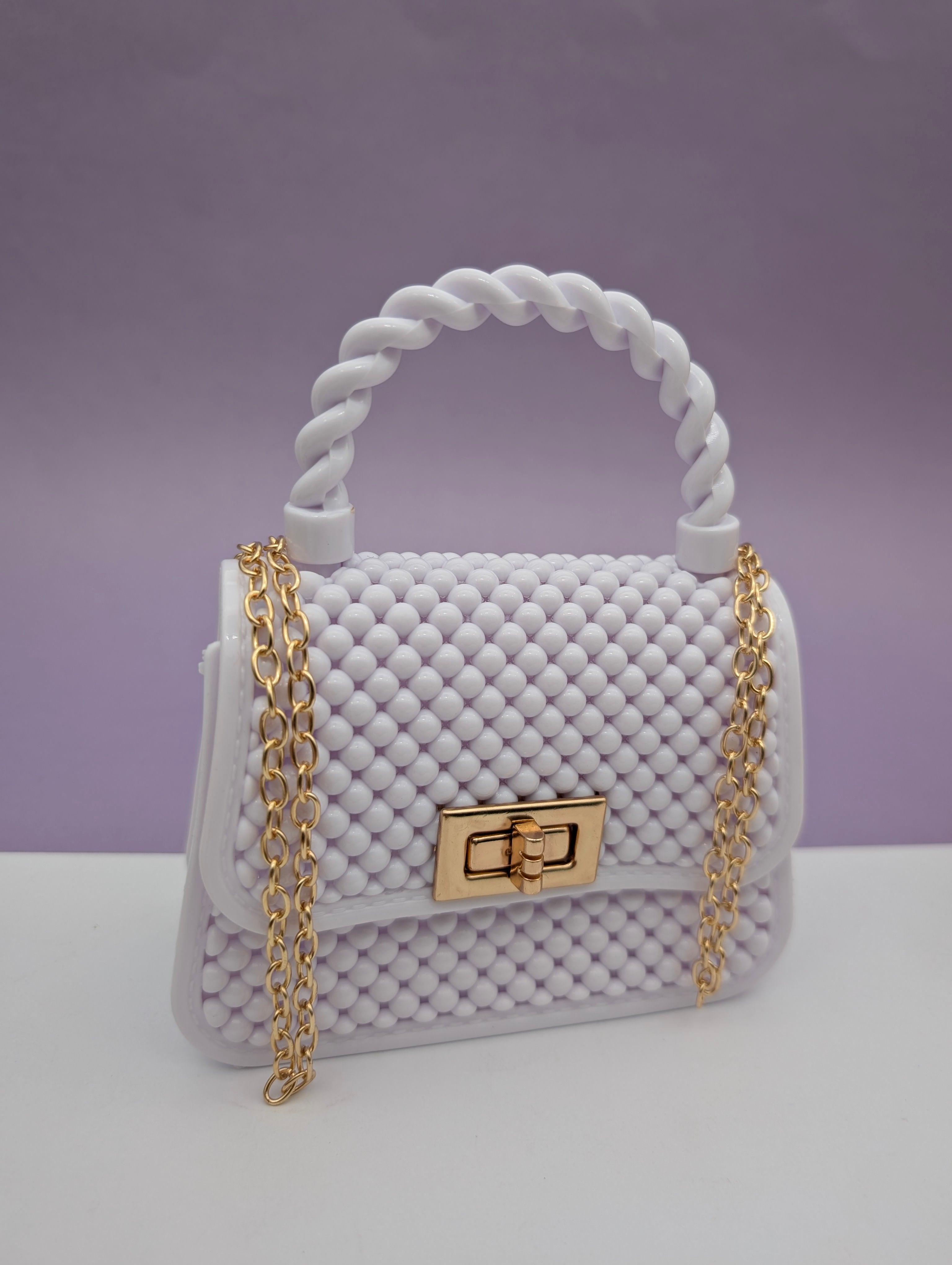 TEXTURED TWIST HANDLE MINI BAGS