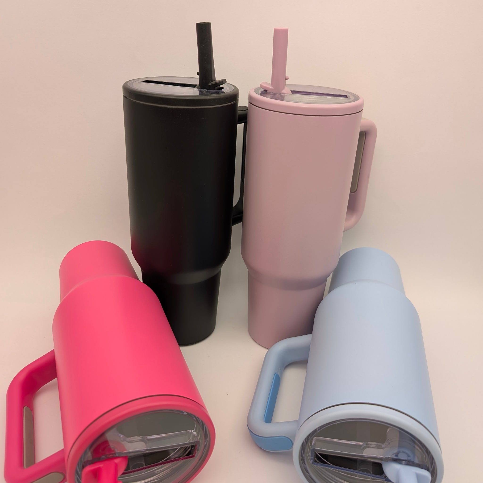 VACUUM INSULATED TUMBLER WITH HANDLE